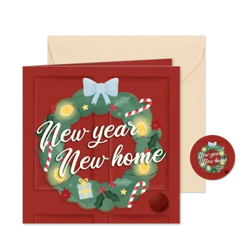 Verhuiskaart kerst deur met kerstkrans new year new home